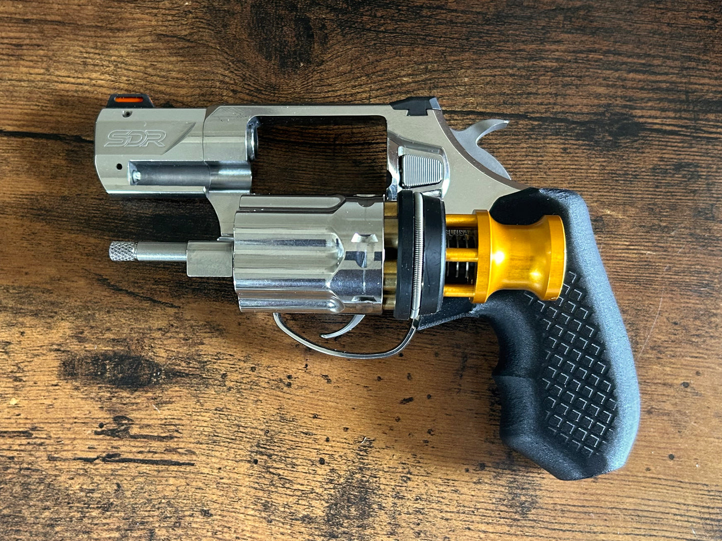 Concealed carry grips for the hammered Diamondback SDR revolver. Before, wheelgun folks had to choose between shooting comfort (rubber grips) or carry comfort (wood or G10 grips). Recoil Rider revolver grips provide both, featuring the recoil absorption of rubber grips with the snag-free comfort of wooden grips. Plus, they reduce the weight for easier carry and improve the grip angle of your Diamondback SDR for a more natural point-of-aim. Perfect if you're carrying your revolver AIWB or in the pocket.