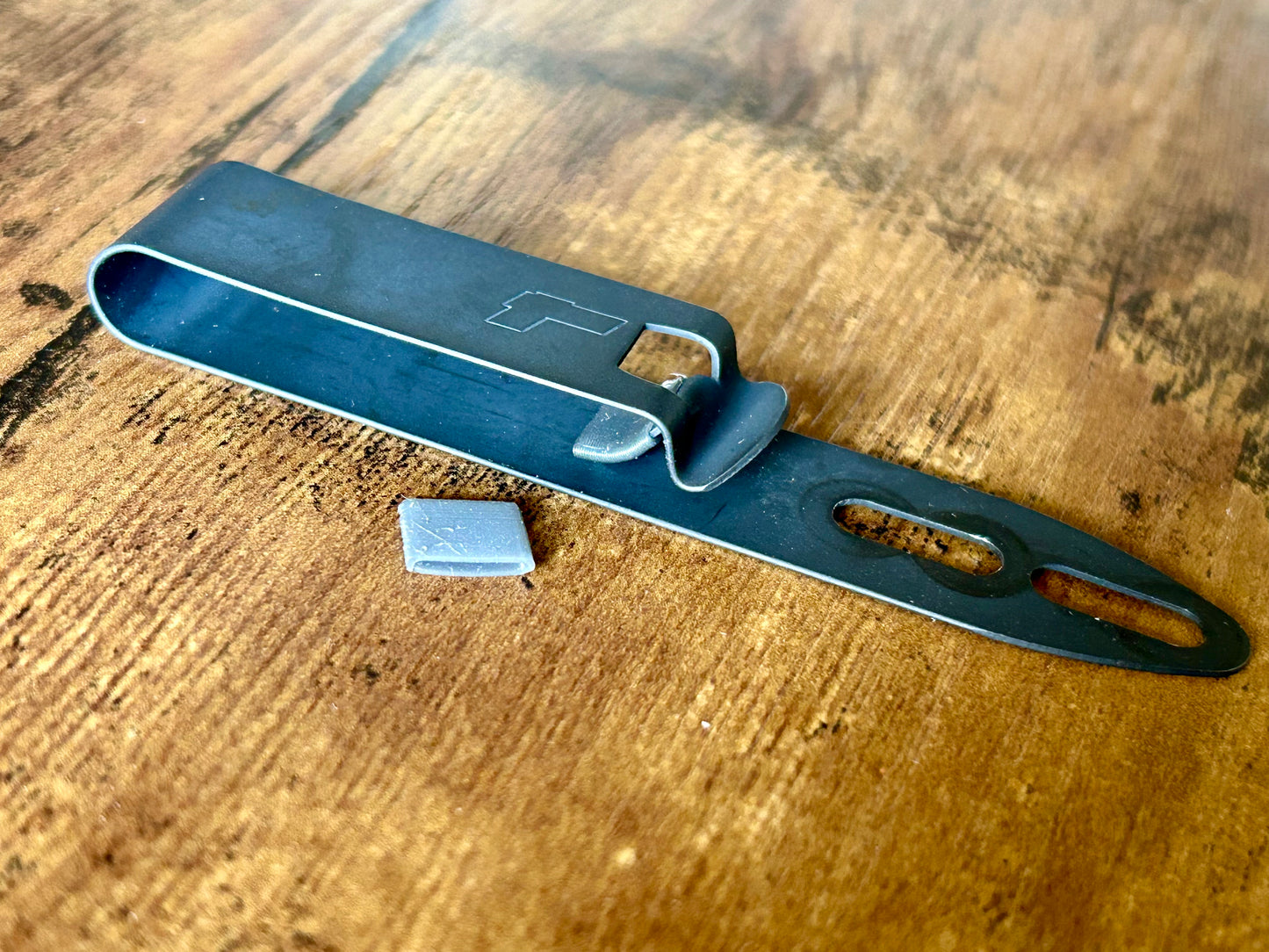 This custom-made "Pants-Saver" cover is designed to fit over the DCC clip to prevent wear and tear on your pants from daily concealed carry. The covers are made from a rubbery polyurethane and last virtually forever.