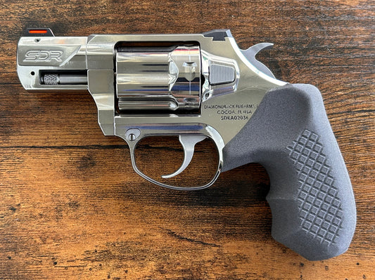 Concealed carry grips for the hammered Diamondback SDR revolver. Before, wheelgun folks had to choose between shooting comfort (rubber grips) or carry comfort (wood or G10 grips). Recoil Rider revolver grips provide both, featuring the recoil absorption of rubber grips with the snag-free comfort of wooden grips. Plus, they reduce the weight for easier carry and improve the grip angle of your Diamondback SDR for a more natural point-of-aim. Perfect if you're carrying your revolver AIWB or in the pocket.