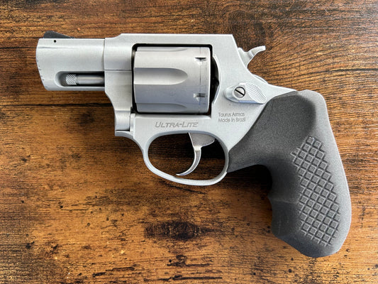 "Zero-compromise" concealed carry grips for the Taurus 856 line. Before, wheelgun folks had to choose between shooting comfort (rubber grips) or carry comfort (wood or G10 grips). Recoil Rider revolver grips provide both, featuring the recoil absorption of rubber grips with the snag-free comfort of wooden grips. Plus, they reduce the weight for easier carry and improve the grip angle of your Taurus 856 for a more natural point-of-aim. If you're carrying your revolver AIWB or in the pocket, these utilitarian