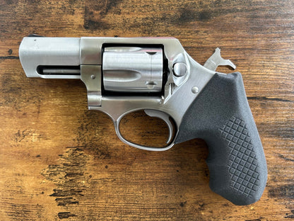 "Zero-compromise" concealed carry grips for the Ruger SP101 revolver. Before, wheelgun folks had to choose between shooting comfort (rubber grips) or carry comfort (wood or G10 grips). Recoil Rider revolver grips provide both, featuring the recoil absorption of rubber grips with the snag-free comfort of wooden grips. Plus, they reduce the weight for easier carry and improve the grip angle of your Ruger SP101 for a more natural point-of-aim. CCW grips for folks who carry their Ruger SP101 appendix.