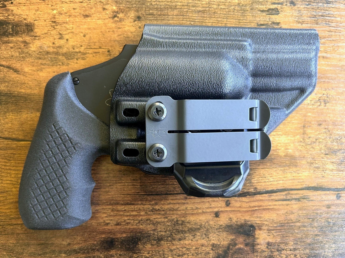 Internal hammer j-frame (model 642/442/340) with Recoil Rider boot grips and Harry's Holster Icon 2.0 for appendix carry.