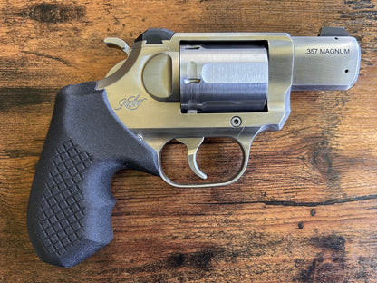"Zero-compromise" concealed carry grips for the Kimber K6XS and K6S revolver line. Before, wheelgun folks had to choose between shooting comfort (rubber grips) or carry comfort (wood or G10 grips). Recoil Rider revolver grips provide both, featuring the recoil absorption of rubber grips with the snag-free comfort of wooden grips. Plus, they reduce the weight for easier carry. If you're carrying your revolver AIWB or in the pocket, these utilitarian grips will provide a superior shooting and CCW experience. 