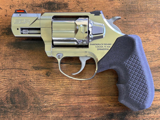 Concealed carry grips for the hammered Diamondback SDR revolver. Before, wheelgun folks had to choose between shooting comfort (rubber grips) or carry comfort (wood or G10 grips). Recoil Rider revolver grips provide both, featuring the recoil absorption of rubber grips with the snag-free comfort of wooden grips. Plus, they reduce the weight for easier carry and improve the grip angle of your Diamondback SDR for a more natural point-of-aim. Perfect if you're carrying your revolver AIWB or in the pocket.