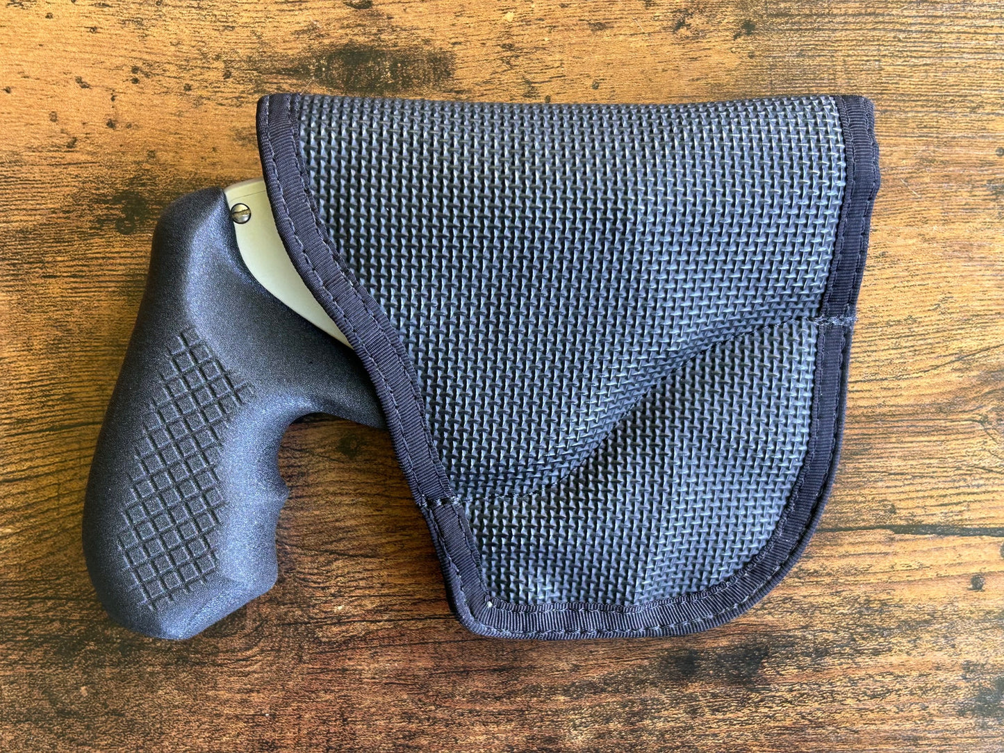 Internal hammer j-frame (model 642/442) and DeSantis Gunhide holster for pocket carry.