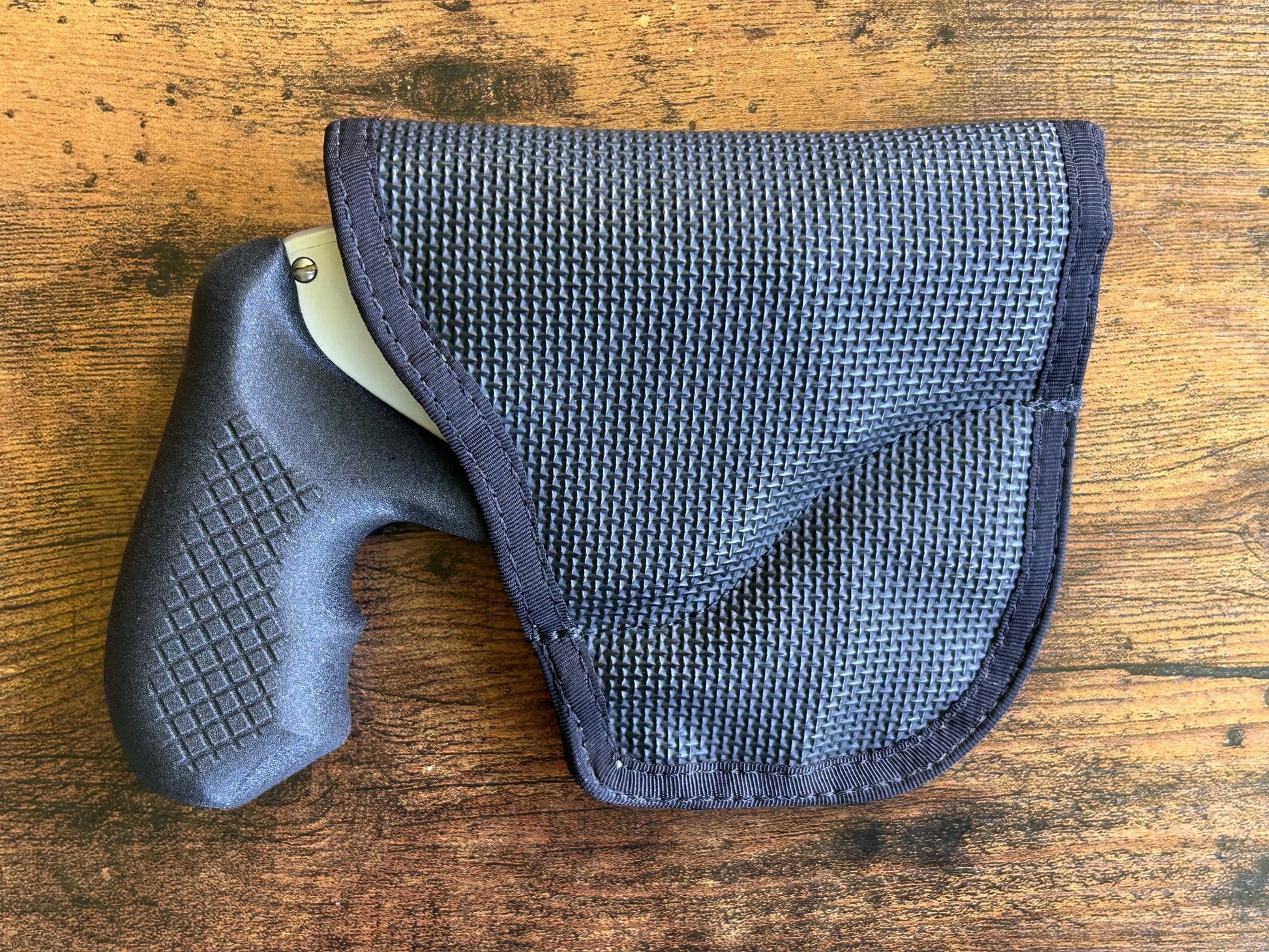 Internal hammer j-frame (model 642/442) and DeSantis Gunhide holster for pocket carry.
