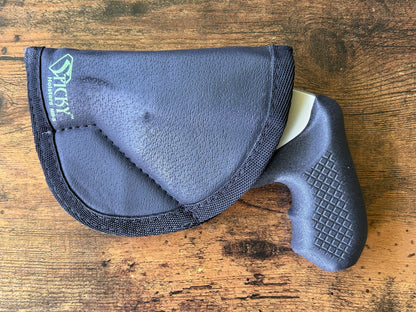 Internal hammer J-frame (model 642/442) and Sticky Holster holster for pocket carry.