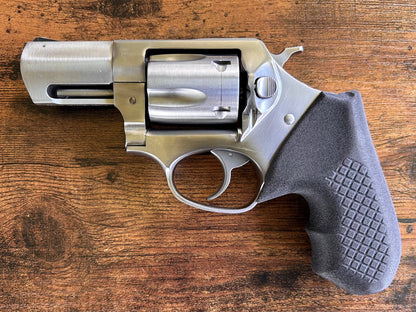 "Zero-compromise" concealed carry grips for the Ruger SP101 revolver. Before, wheelgun folks had to choose between shooting comfort (rubber grips) or carry comfort (wood or G10 grips). Recoil Rider revolver grips provide both, featuring the recoil absorption of rubber grips with the snag-free comfort of wooden grips. Plus, they reduce the weight for easier carry and improve the grip angle of your Ruger SP101 for a more natural point-of-aim. CCW grips for folks who carry their Ruger SP101 Appendix.