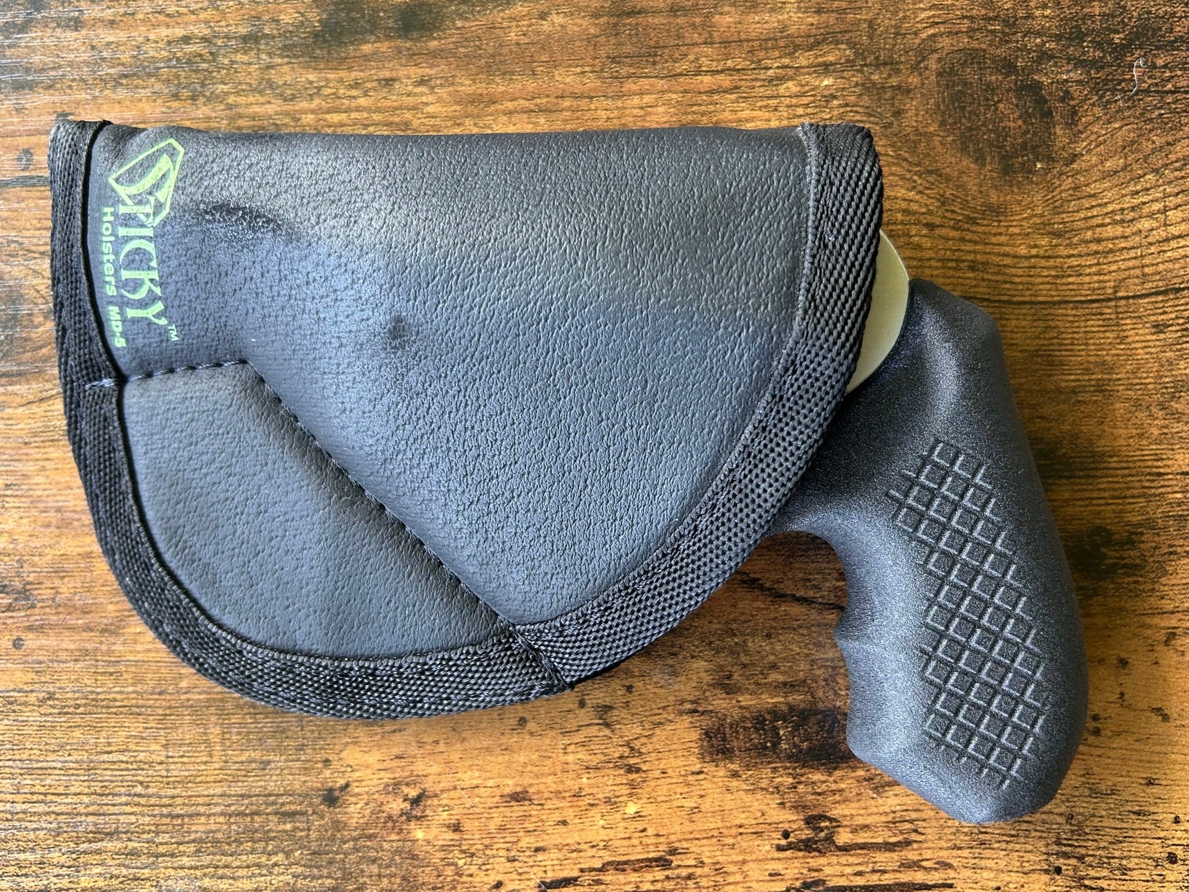 Shrouded hammer J-frame (model 638/49) and Sticky Holster holster for pocket carry.