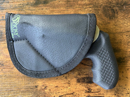 Shrouded hammer J-frame (model 638/49) and Sticky Holster holster for pocket carry.