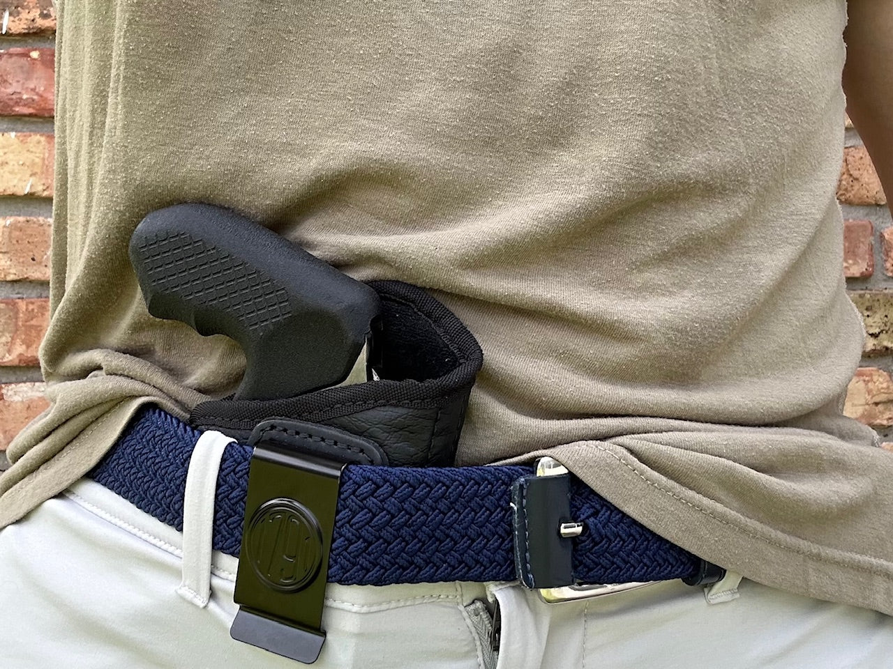Conceal carrying the Charter Arms Underciver revolver with Recoil Rider CCW grips in the 1791 holster, appendix position.